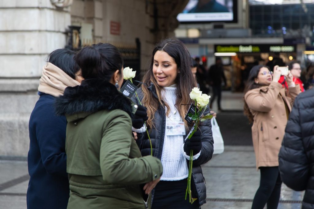 Customer interaction at Victoria's Secrets experiential activation on external promotional site at London Victoria Station